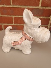 This is a white ceramic West Highland Terrier figurine, Money Box