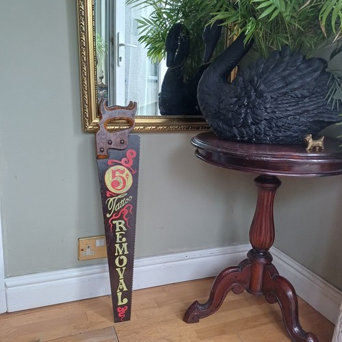 Tattoo removal vintage handsaw - tattoo,