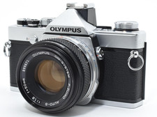 Near mint olympus om - near,