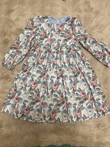Dolly wears floral - dolly, size