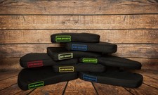 Tractor hedge trimmer arm rest
