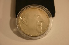2011 Prince Philip 90th Birthday £5 Proof Coin with natural toning.