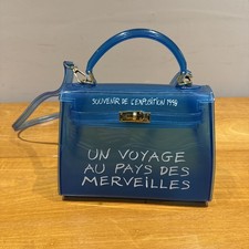 Un Voyage Au Pays des Merveilles 1998 Crossbody Bag Blue Transparent
