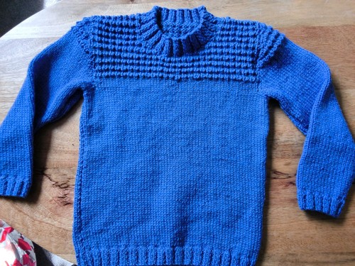 Children blue hand knitted - hand,