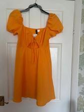 Divided women’s midi dress size 12 brand new with tags orange
