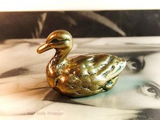 Small brass duck