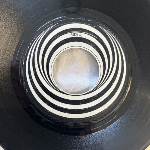 Vertigo swirl label black - vertigo,