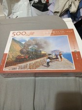 FOLLOWING THE TRAIN BY MALCOLM