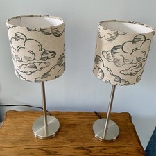Pair table lamps with hand - table,