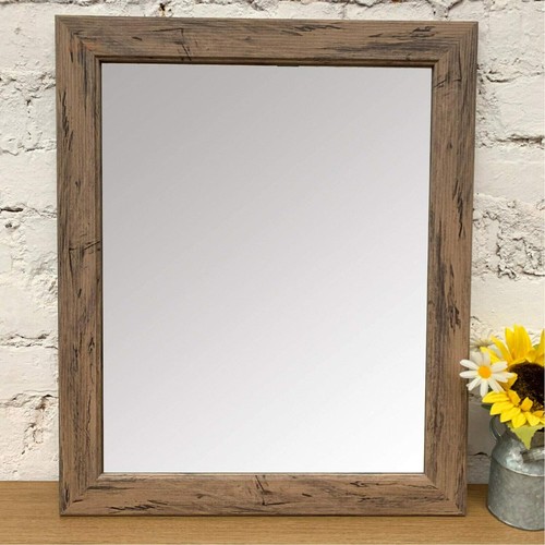 Dark wooden framed mirror - framed,