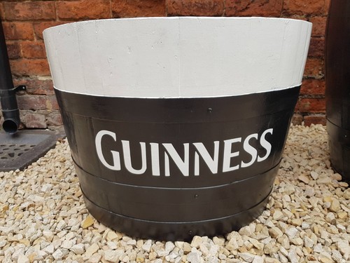 Half whiskey barrel guinness - half,