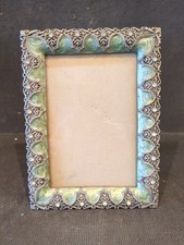 VINTAGE WHITE METAL & GREEN ENAMEL TYPE CHASED & JEWELED GLAZED PHOTO FRAME
