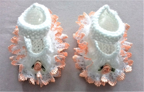 Hand knitted dolls clothes