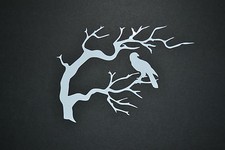 BIRD OF PREY IN TREE EAGLE