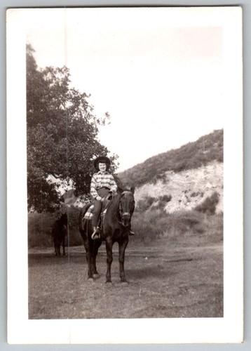 Vtg snapshot boy on horse - b&w,