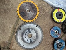 2 X Circular Saw blades. 1 Dewalt 165 x 1.7 mm. 1 Unbranded 216 x 2.7 mm