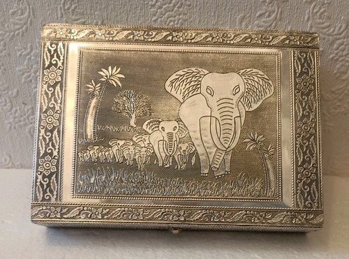 Indian embossed silver tone - embossed,