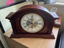 Seiko wooden mantel clock   Westminster chimes which can be turned off.