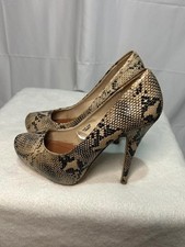 Atmosphere snake skin shoes