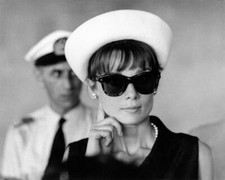 Audrey Hepburn wearing a big