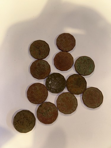 Three pence coins - pence,