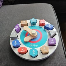Hamley’s Shape Sort Teaching Clock Wooden Toy