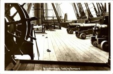 Quarterdeck looking forward RPPC postcard antique Royal Navy cannons guns