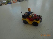 Quad Bike with a Fireman Sam Figure.