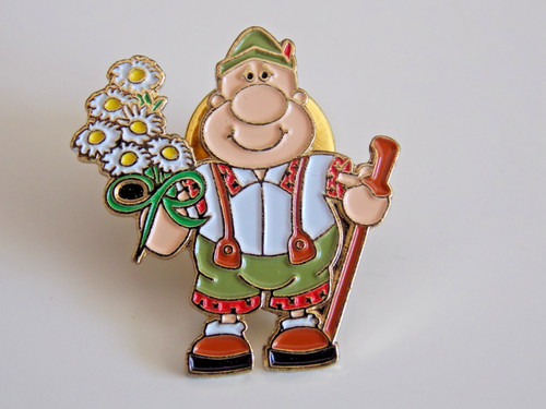 Macmillan cancer relief pin - relief,