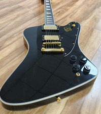 Black Firebird electric guitar
