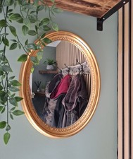 Vintage oval gold ornate wall