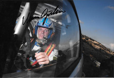 Marcus Gronholm SIGNED 12x8  Ford Rally Team Portrait 2006  2 x World Champion