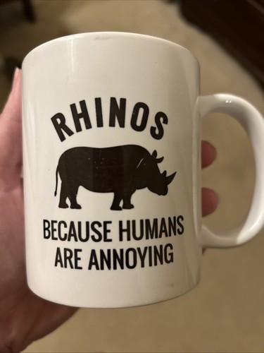 Rhinos because humans - rhinos,