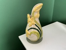 Shaped pottery daffodil vase