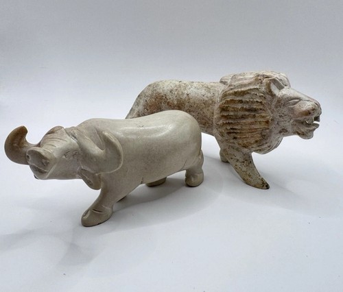 Lion and bull - bull, hand