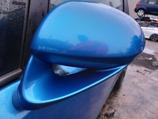 VAUXHALL CORSA D VXR 2008 WING MIRROR N/S PASSENGER SIDE IN ARDEN BLUE MET. Z291