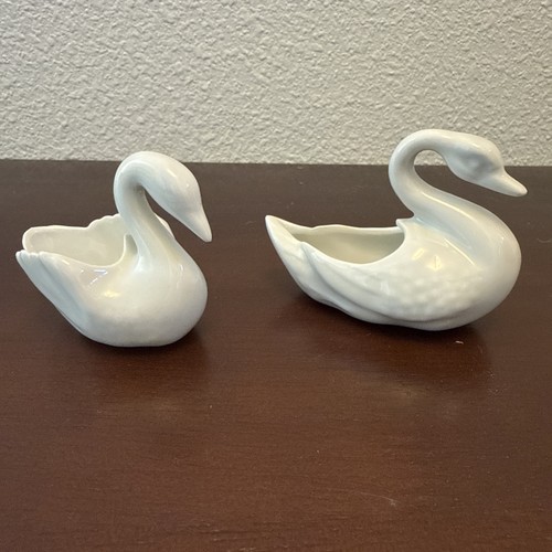 Pair vintage white swan - of,