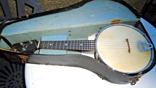 Vintage four stringed banjo - four,