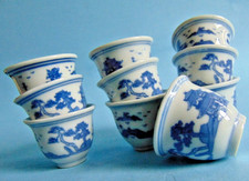 Seven small 35mm blue and white Chinese art porcelain sake cups with clear glaze