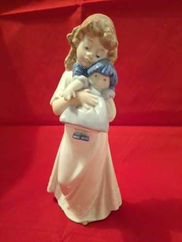 Nao lladro porcelain - porcelain", we
