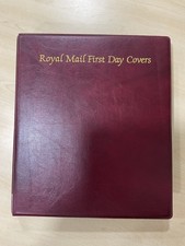 GB first day cover + 1 coin cover in album  F163