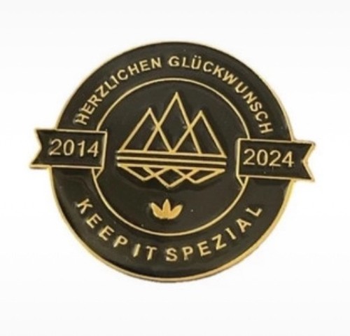 Adi decade pin badge - badge,, stone
