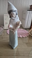 Lladro Porcelain Girl Holding
