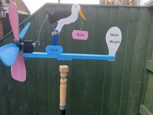 Bird whirligig wind - whirligig, spinner