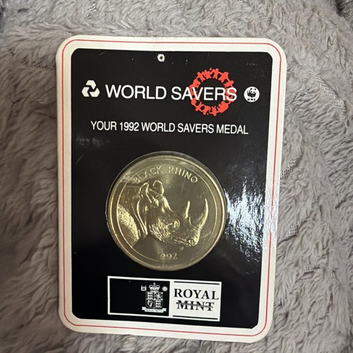 1992 world savers black - "world, savers"