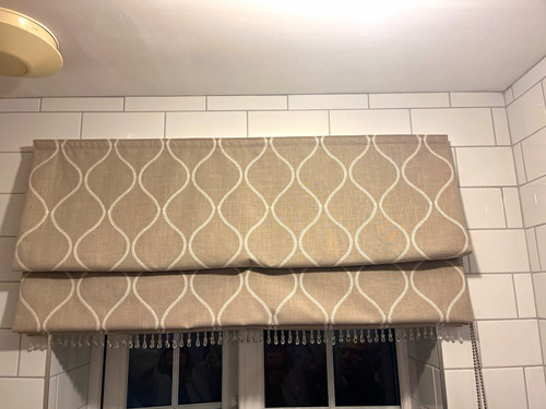 Two matching roman blinds one - roman,