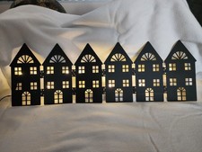 Christmas house shaped lights backdrop. 