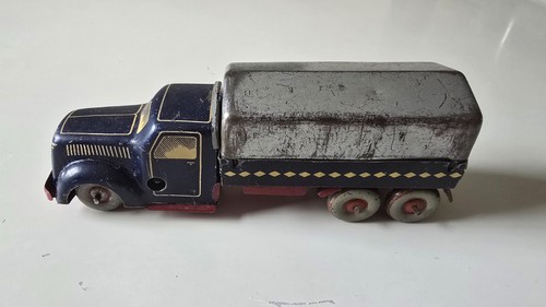 Tin toy autobahn trucks - tin,