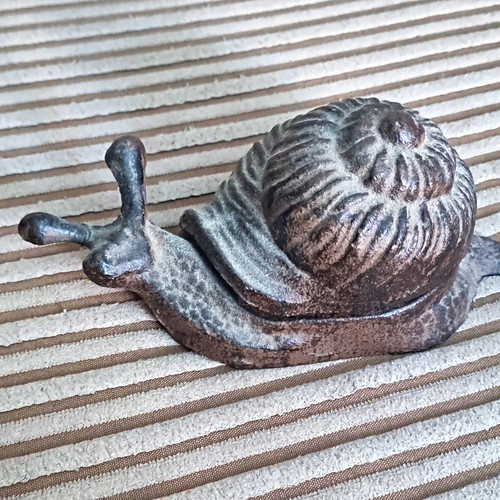 Grey metal snail - metal,