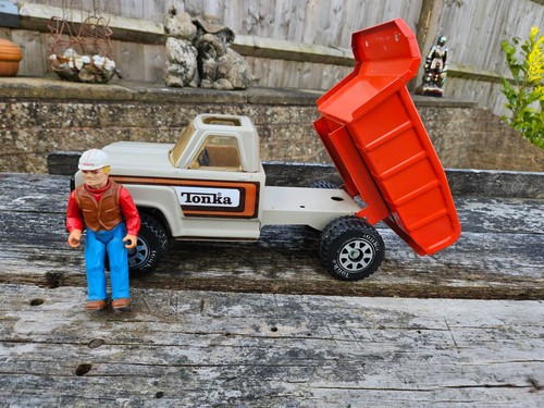 Tonka dump truck and - and, driver